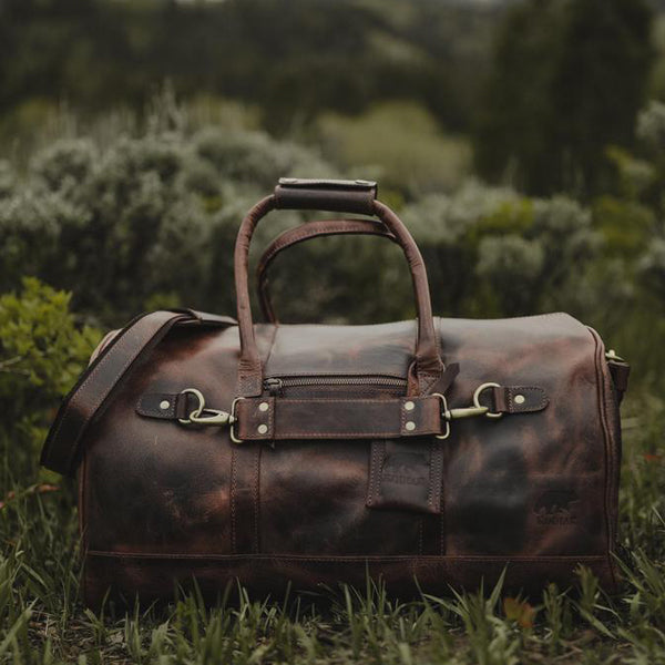 brown leather duffle bag