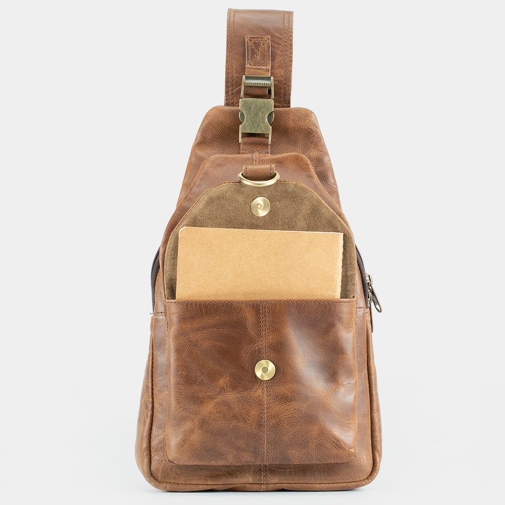 the cross leather sling backpack