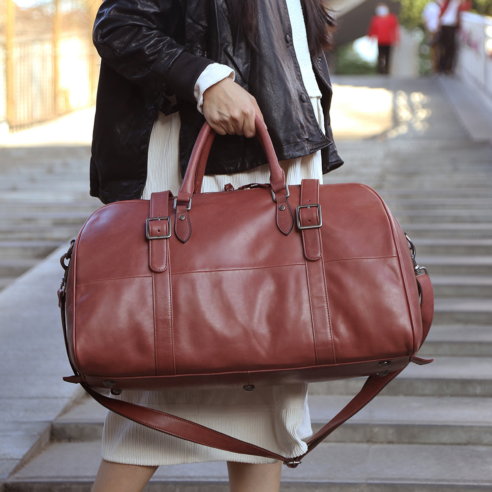red leather duffle bag