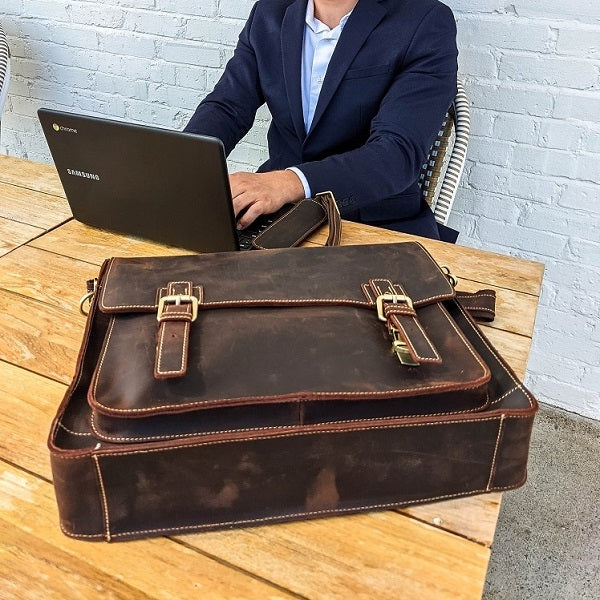 The Daily Men's Leather Messenger Bag for Laptops - Dark Brown Briefcase On Table