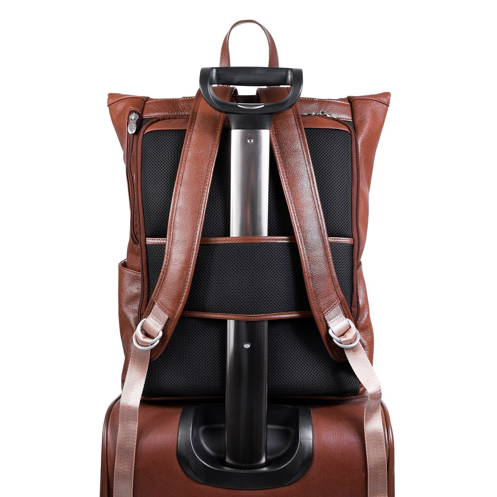 Leather Laptop Backpack for Women & Men - Brown and Black Leather on suitcase