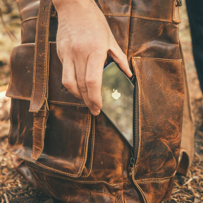 The Kobuk Men's Leather Backpack Roll Top Rucksack For Laptops Antique Brown Phone
