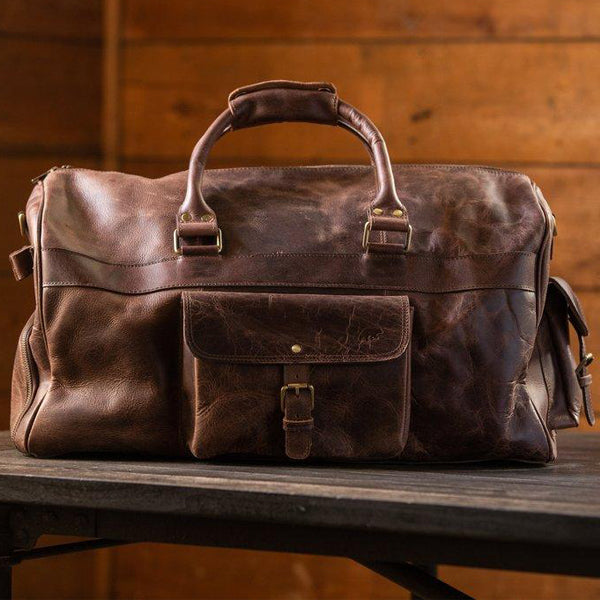 Men's Buffalo Leather Duffel Bag - Weekend Bag for Travel  On Table